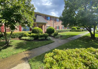 Exterior Features Brick Siding, Landscaped Walkways And Mature Trees